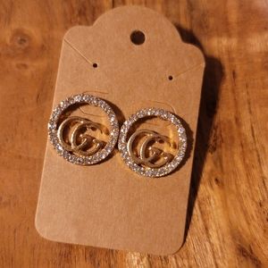 Gold stud earrings